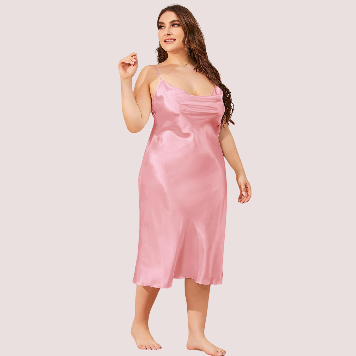 Plus-size model wearing a pink satin slip nightdress, representing extra plus size lingerie for dropshipping