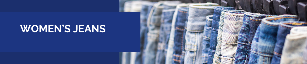 Women’s jeans in various blue denim washes displayed on a clothing rack.